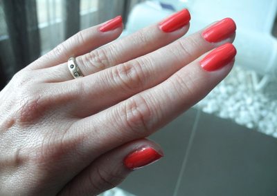Glossy red gel manicure