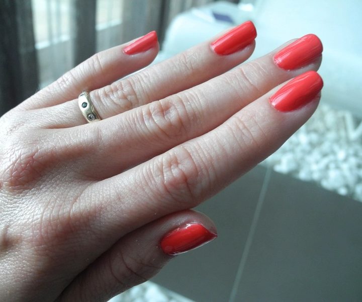Glossy red gel manicure